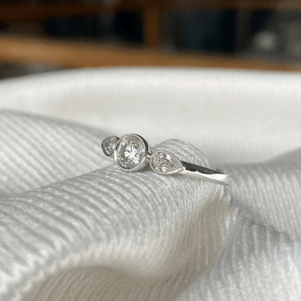 18ct White Gold Diamond Bezel Trilogy Ring