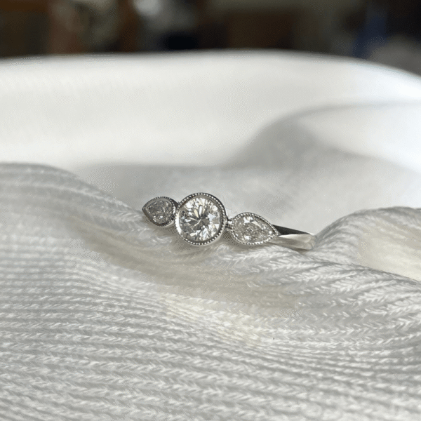 18ct White Gold Diamond Bezel Trilogy Ring