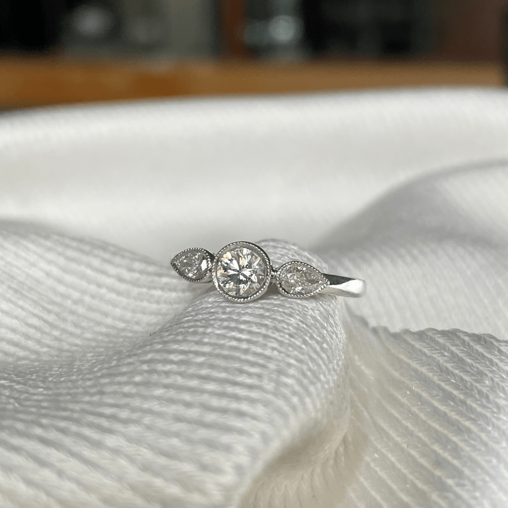 18ct White Gold Diamond Bezel Trilogy Ring