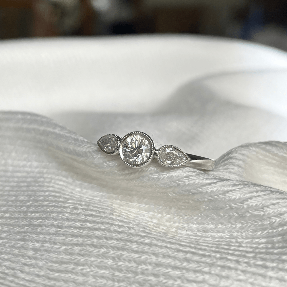 18ct White Gold Diamond Bezel Trilogy Ring