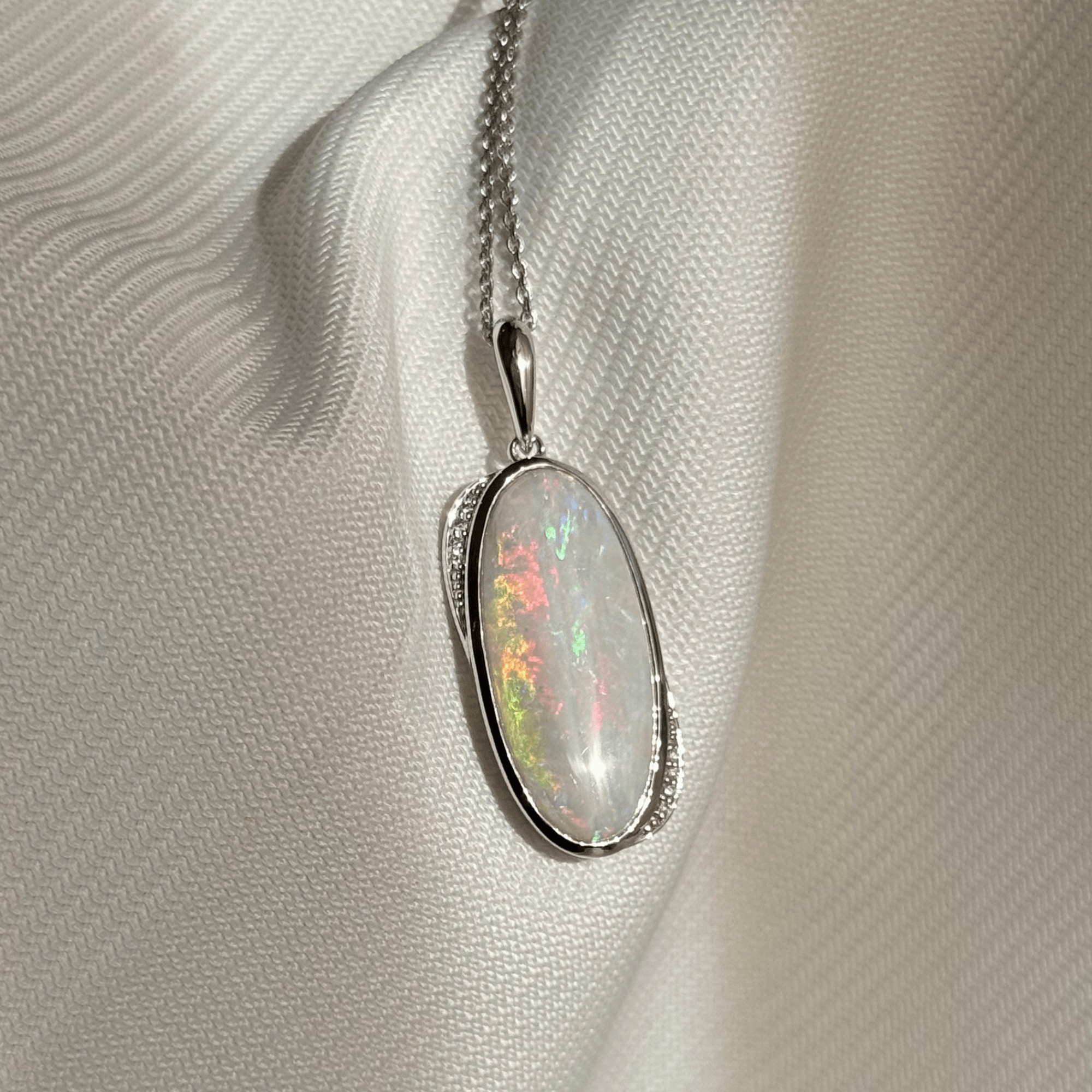 9ct White Gold 5.37ct White Opal & Diamond Pendant