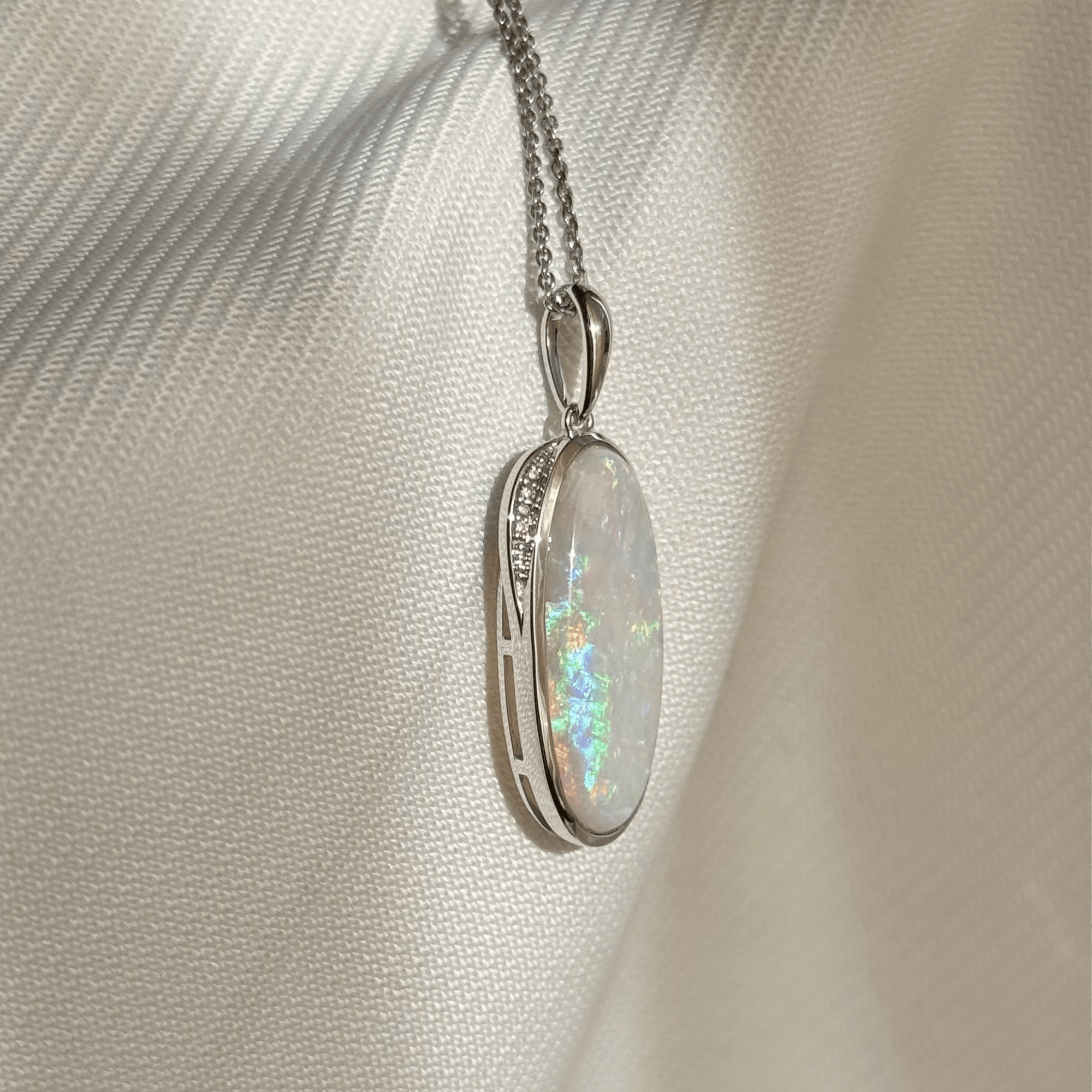9ct White Gold 5.37ct White Opal & Diamond Pendant