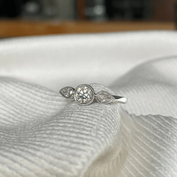 18ct White Gold Diamond Bezel Trilogy Ring