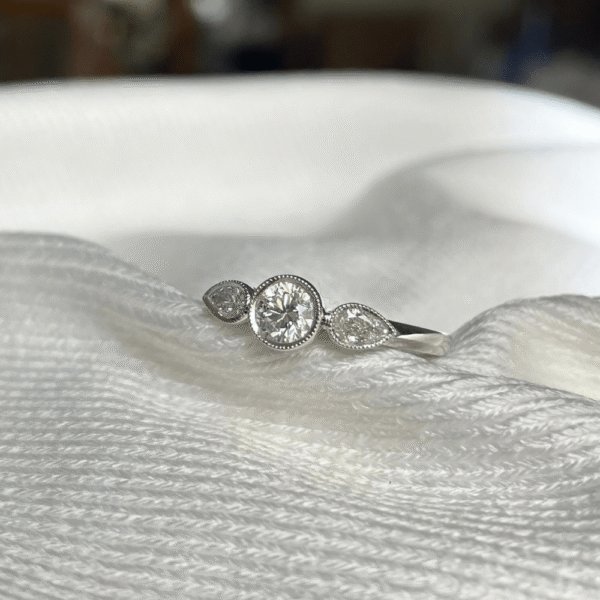 18ct White Gold Diamond Bezel Trilogy Ring