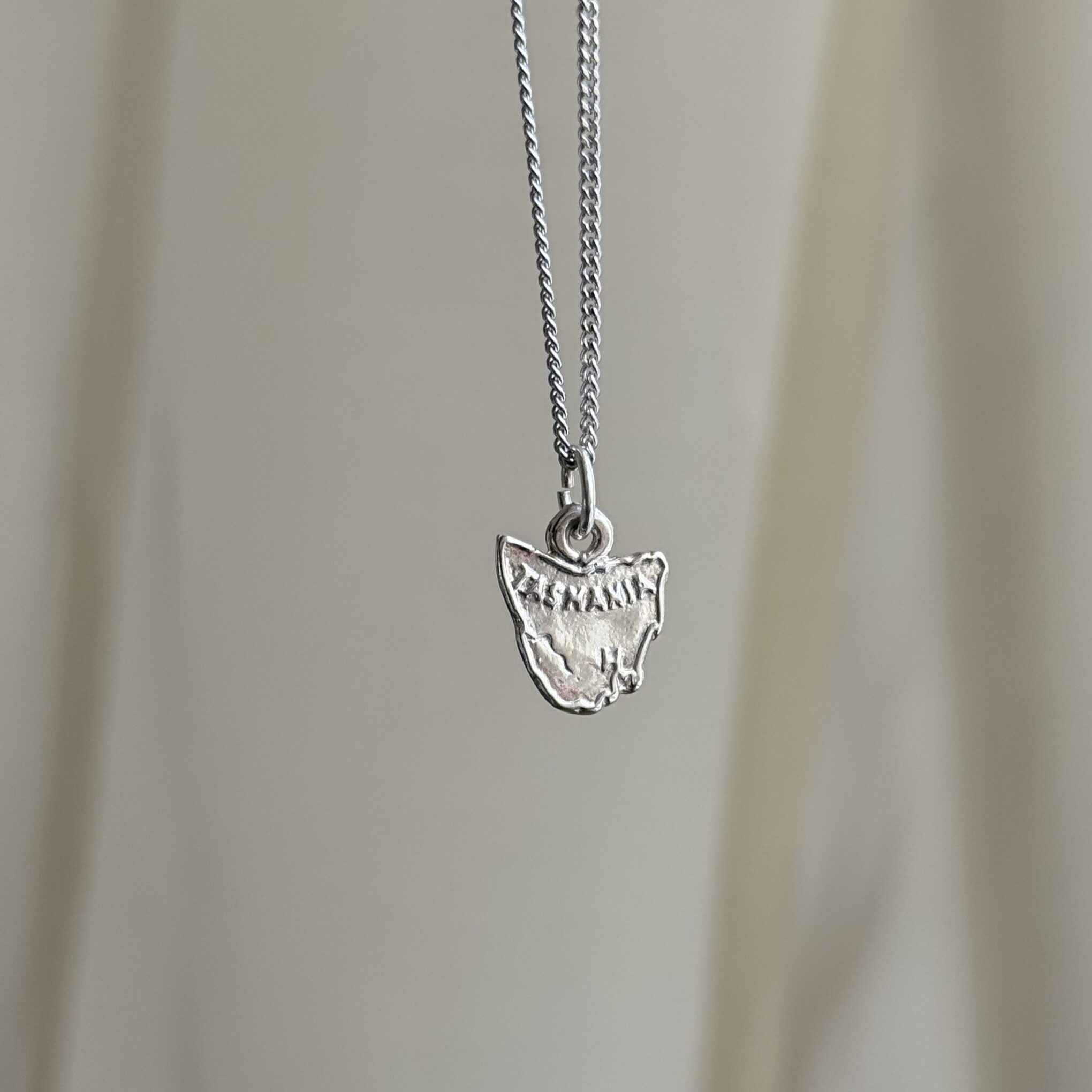 Sterling Silver Small Tassie Map Pendant