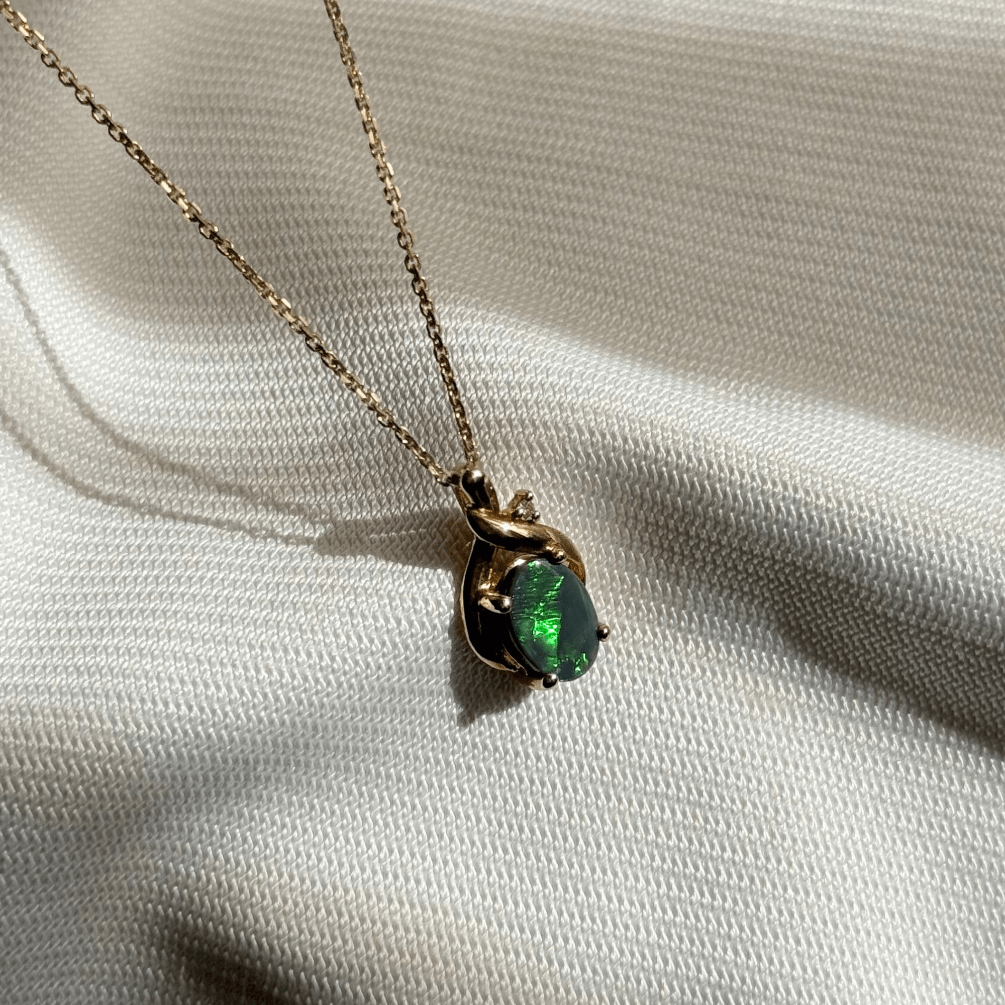 18ct Gold 1.30ct Lightning Ridge Opal & Diamond Pendant