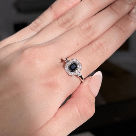9ct White Gold Emerald Cut Sapphire & Diamond Halo Ring